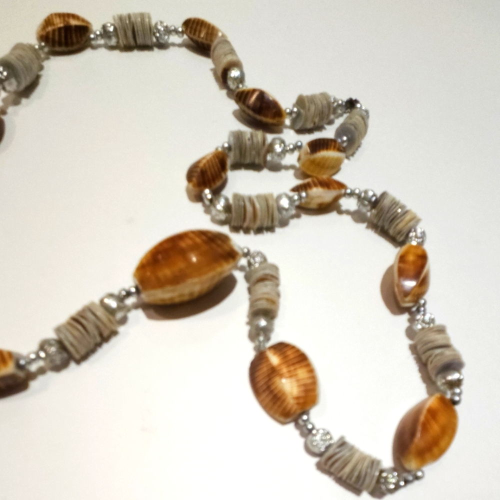 Sea shell with silver plated flower ball necklace